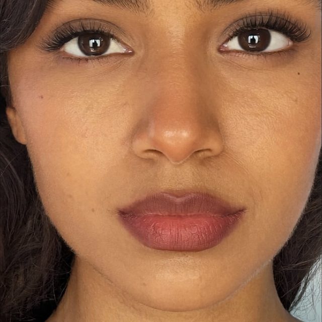 AI model headshot — maroon tube top